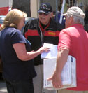picture of Si talking to visitors at the 2014 Morro Bay Car Show, 'Crusin' Morro Bay'
